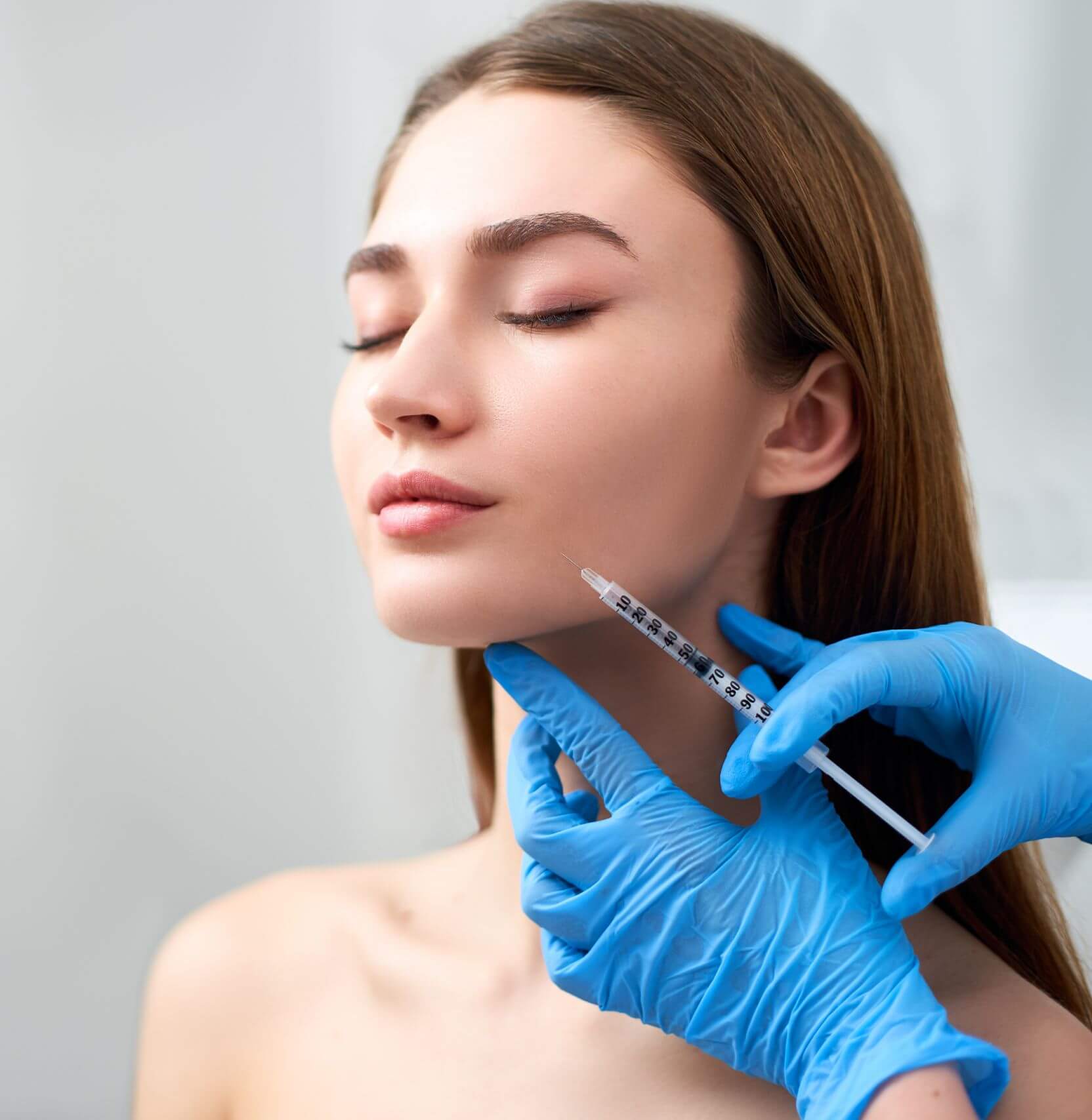 Young Female Getting Dermal Filler Treatment | Gig Harbor Aesthetics in Gig Harbor, WA