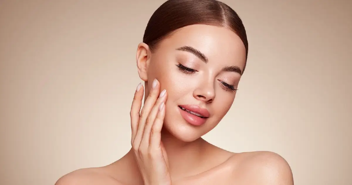 Woman showing smooth, glowing skin after MicroTox® in Gig Harbor, WA