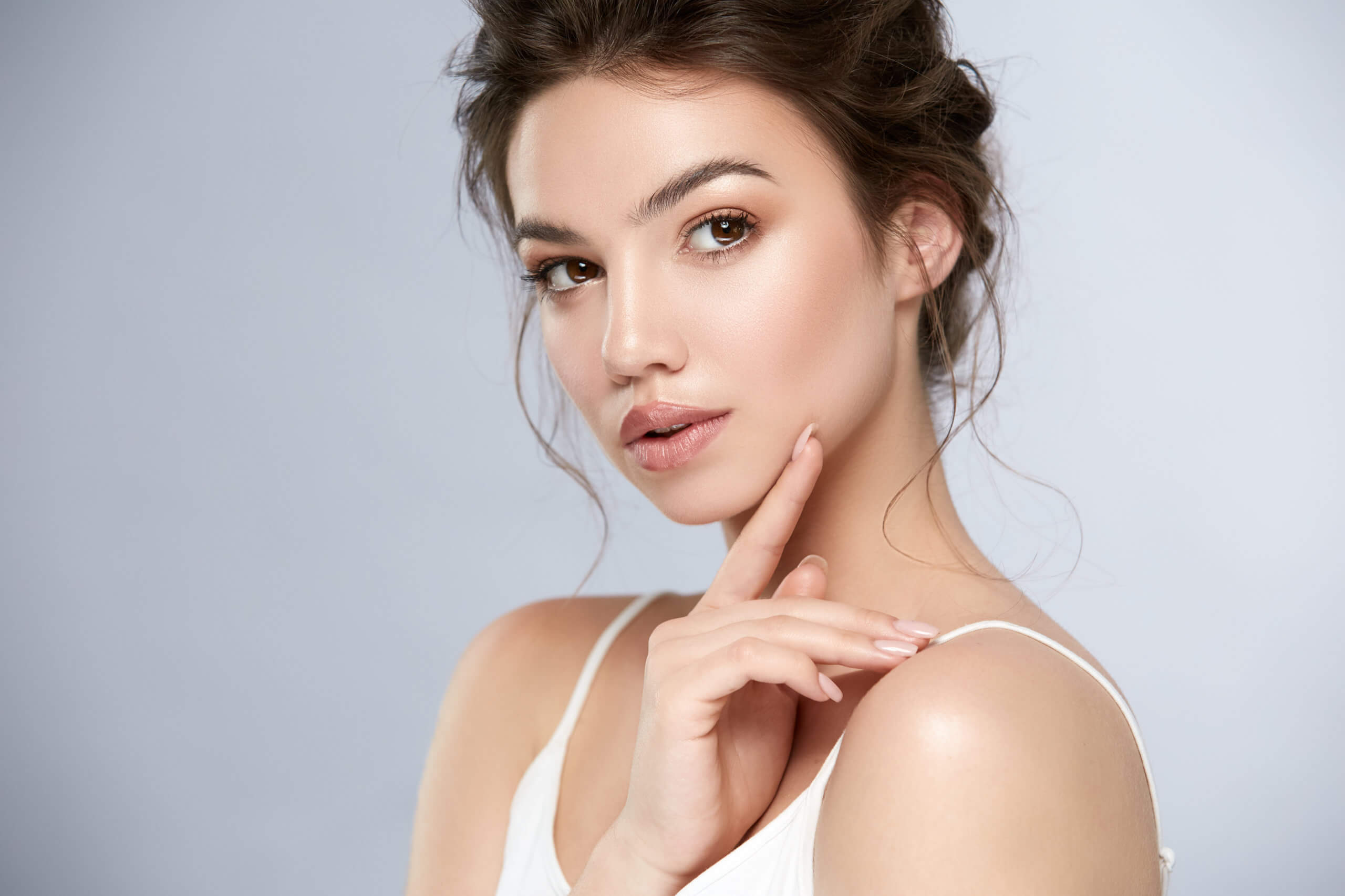 Beauty portrait of woman with shiny make-up and glossy lips | Gig Harbor Aesthetics in Gig Harbor, WA